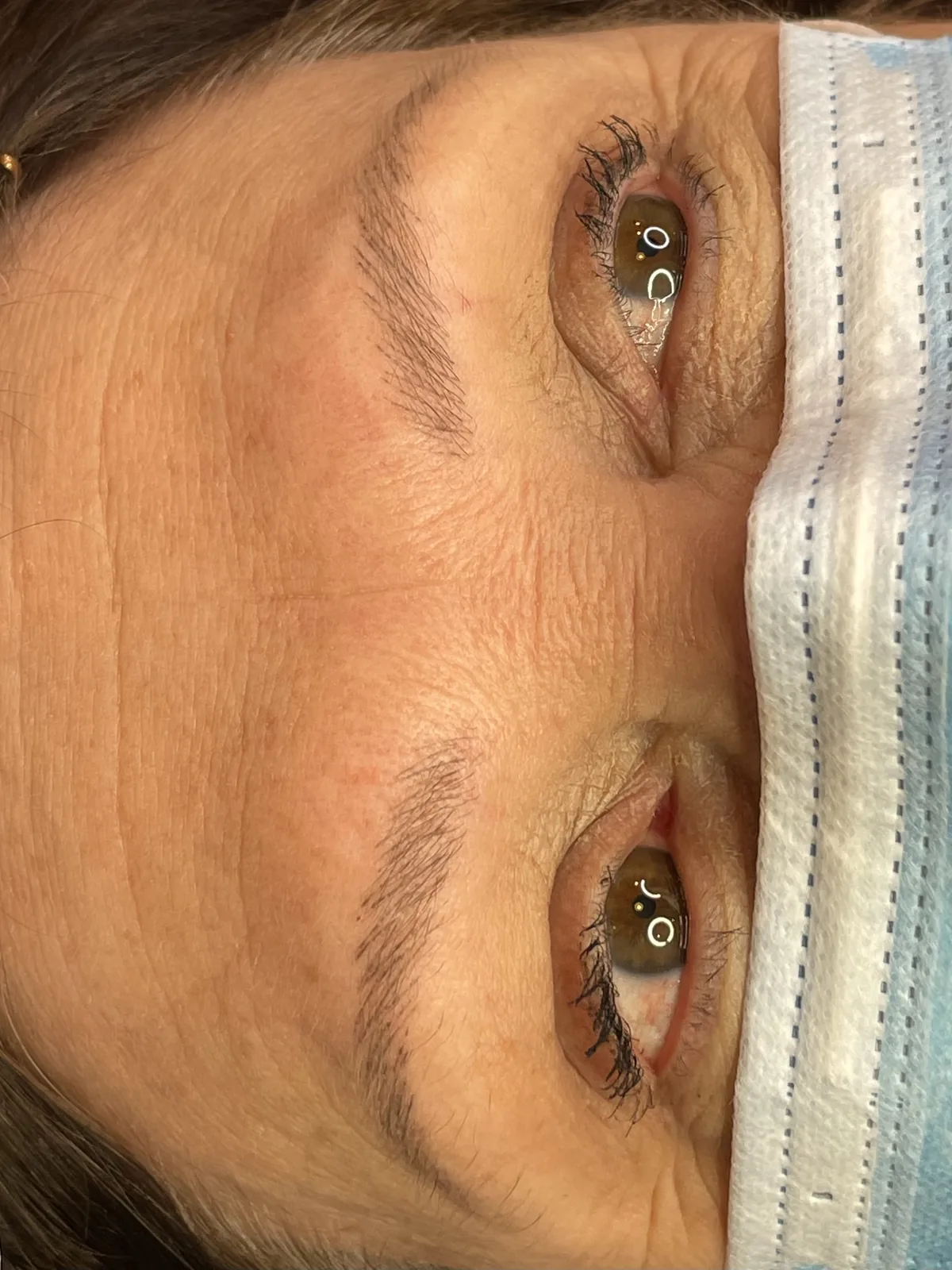 Healed microblading on both brows, matched tapered shape